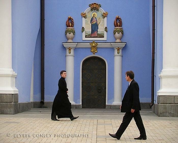 Clergy and Tourist at St. Michael’s Golden-Domed Cathedral in Kyiv, Ukraine